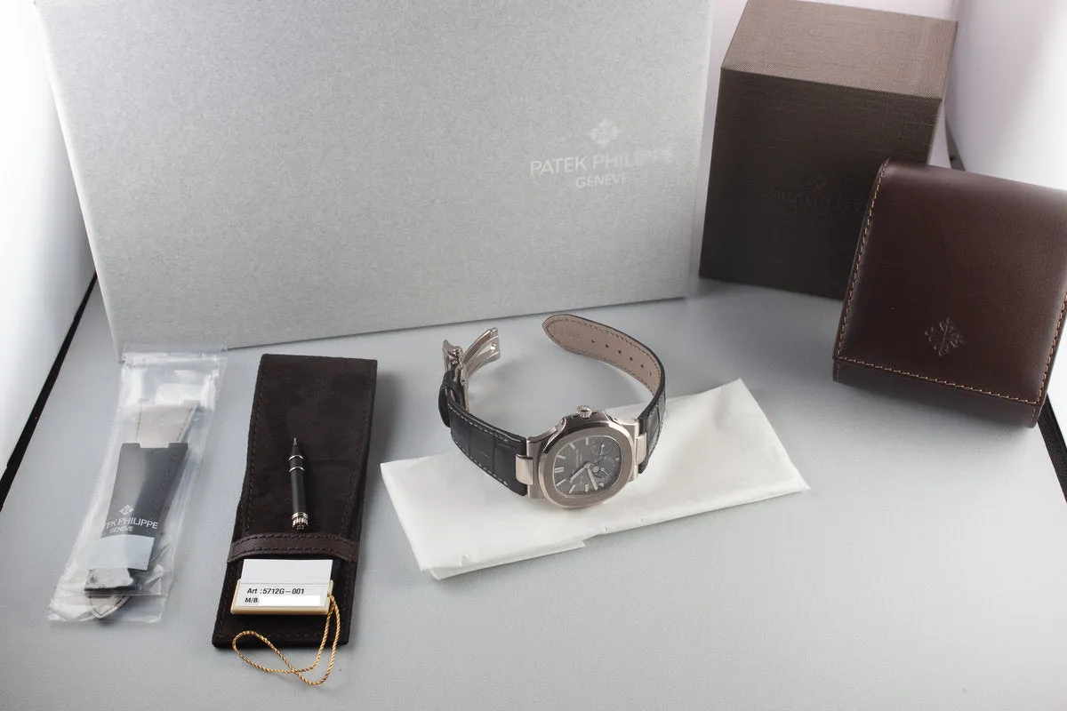 Mint 2018 18K White Gold Patek Philippe Nautilus 5712 Moon Phase Grey Dial with Box, Papers, and Travel Case